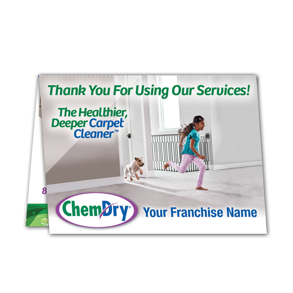Front view of a custom printed folded ChemDry leave behind card with girl and dog running on clean carpet