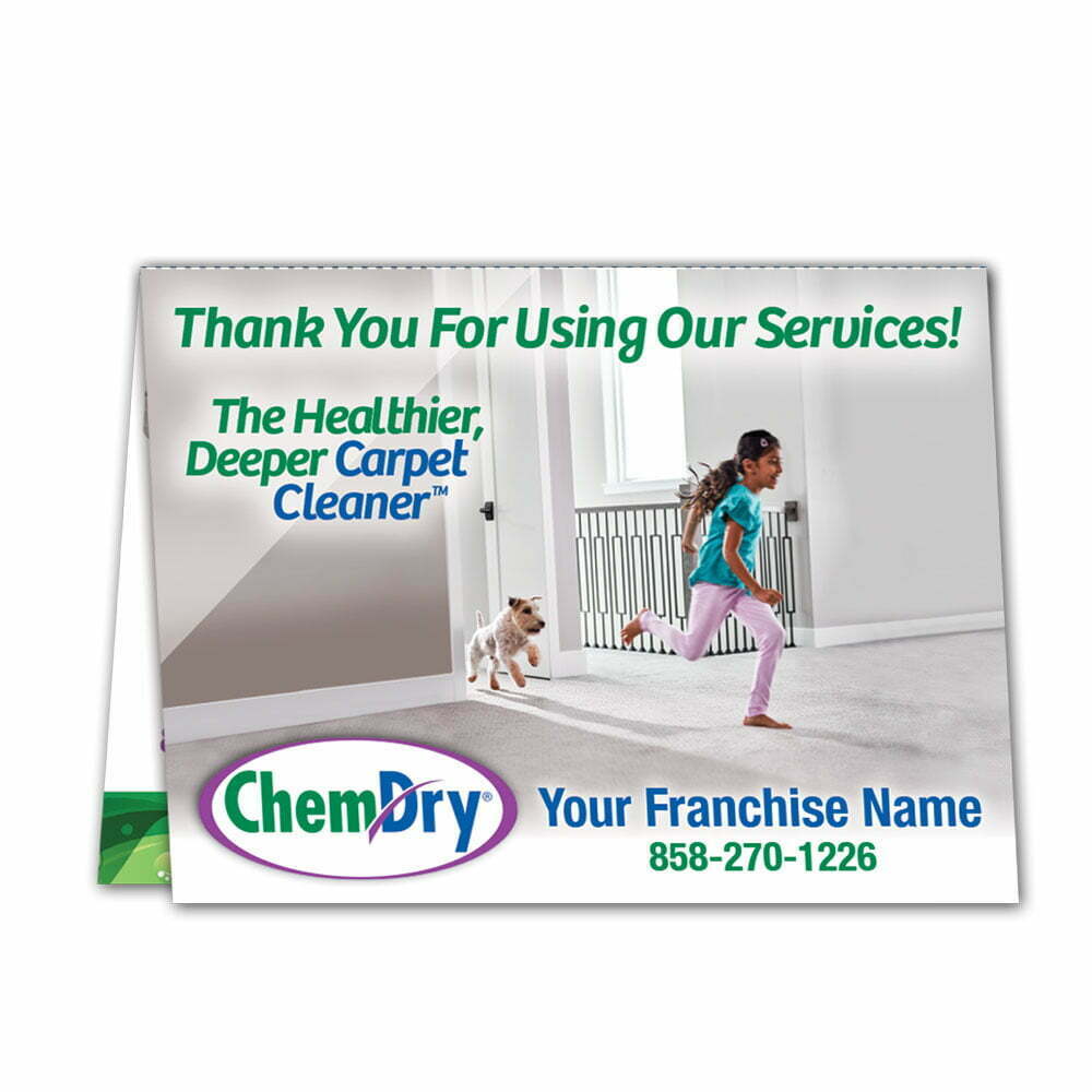 inside view of a custom printed ChemDry tent style folded leave behind card with girl and dog running on clean carpet