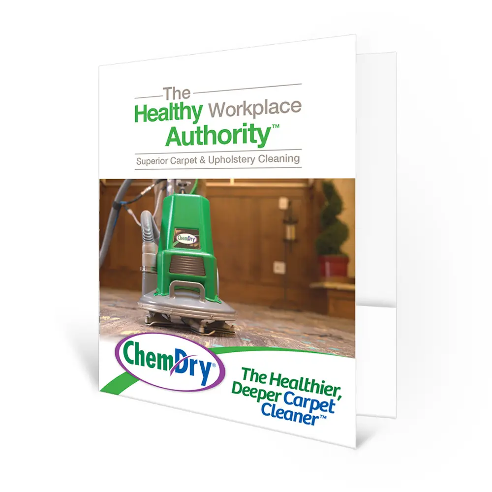 Front profile view of a custom printed ChemDry presentation folder with a floor machine on a wood floor