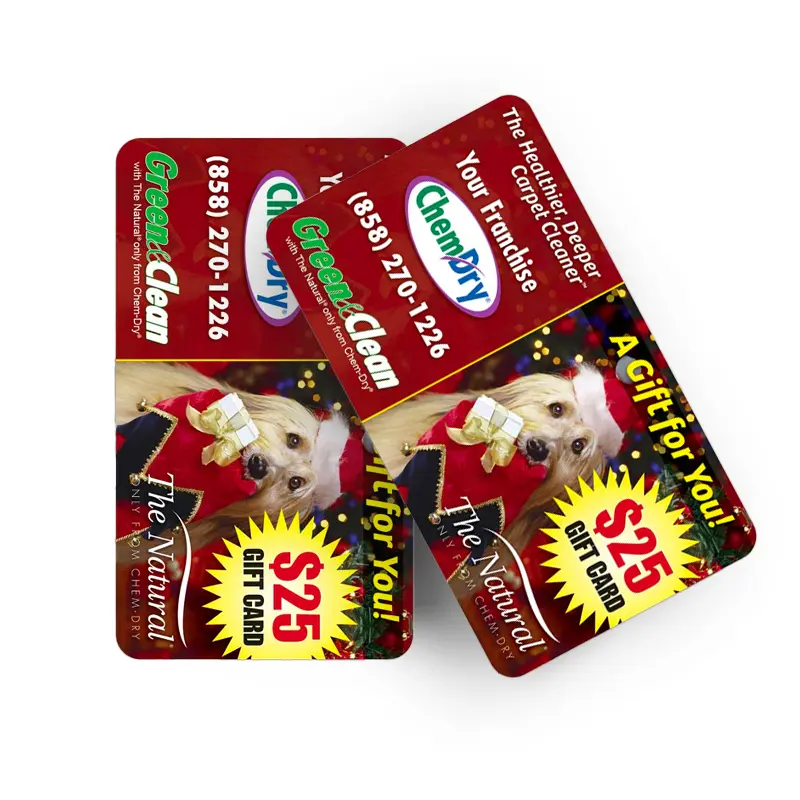 Front Top down view of two custom printed ChemDry branded gift cards with a dog wearing a Christmas hat