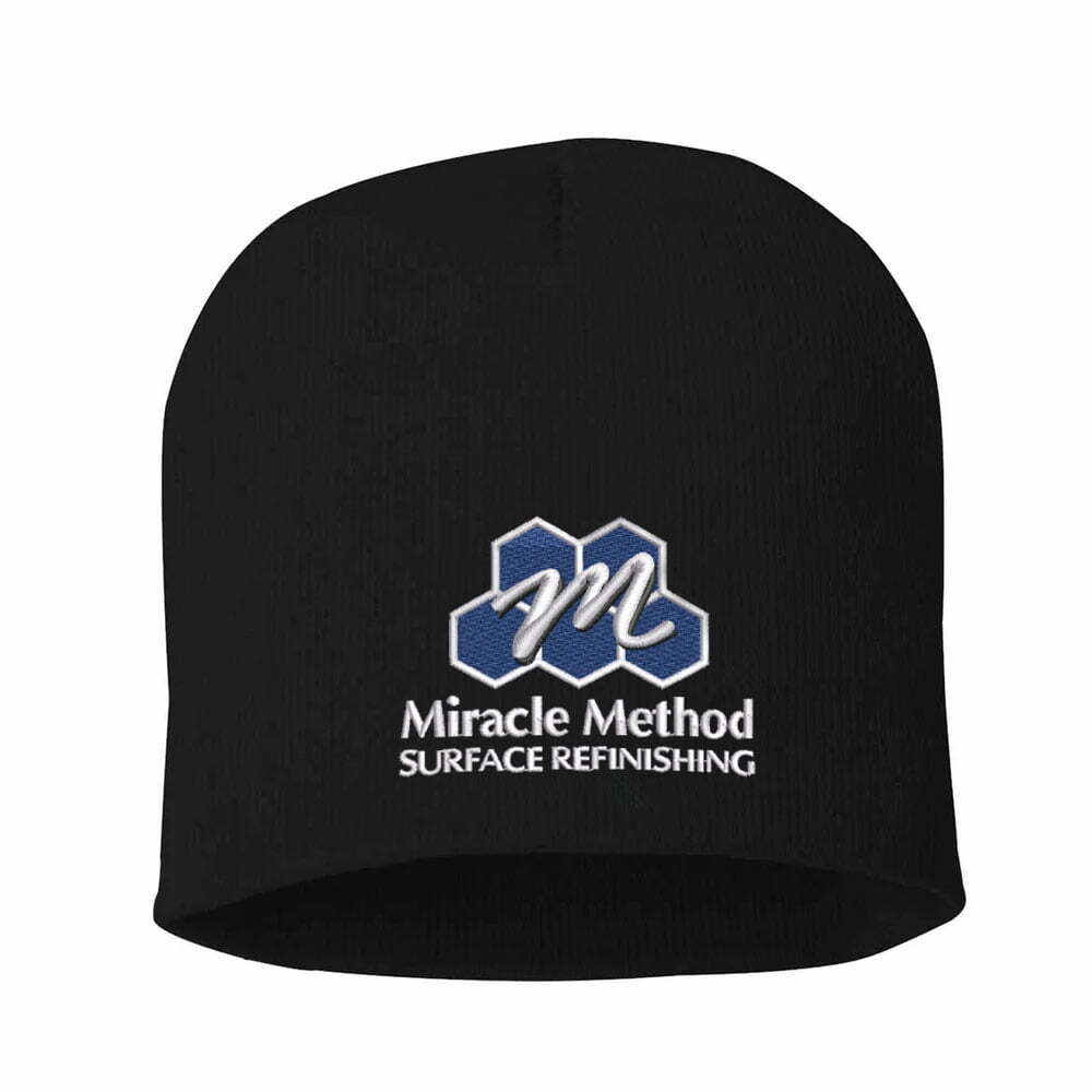 Front view of a custom embroidered Miracle Method black knit cap