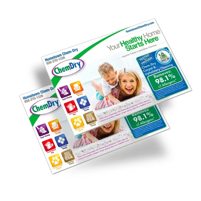 Front side profile view of two custom printed ChemDry branded postcards with baby and mom playing on clean white carpet