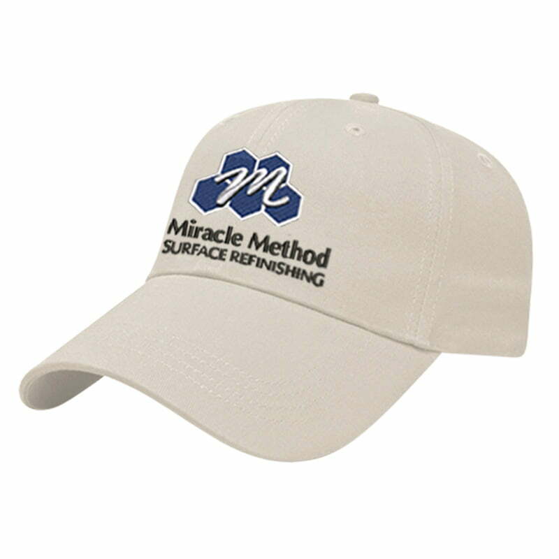 side profile of a custom embroidered Miracle Method beige twill hat