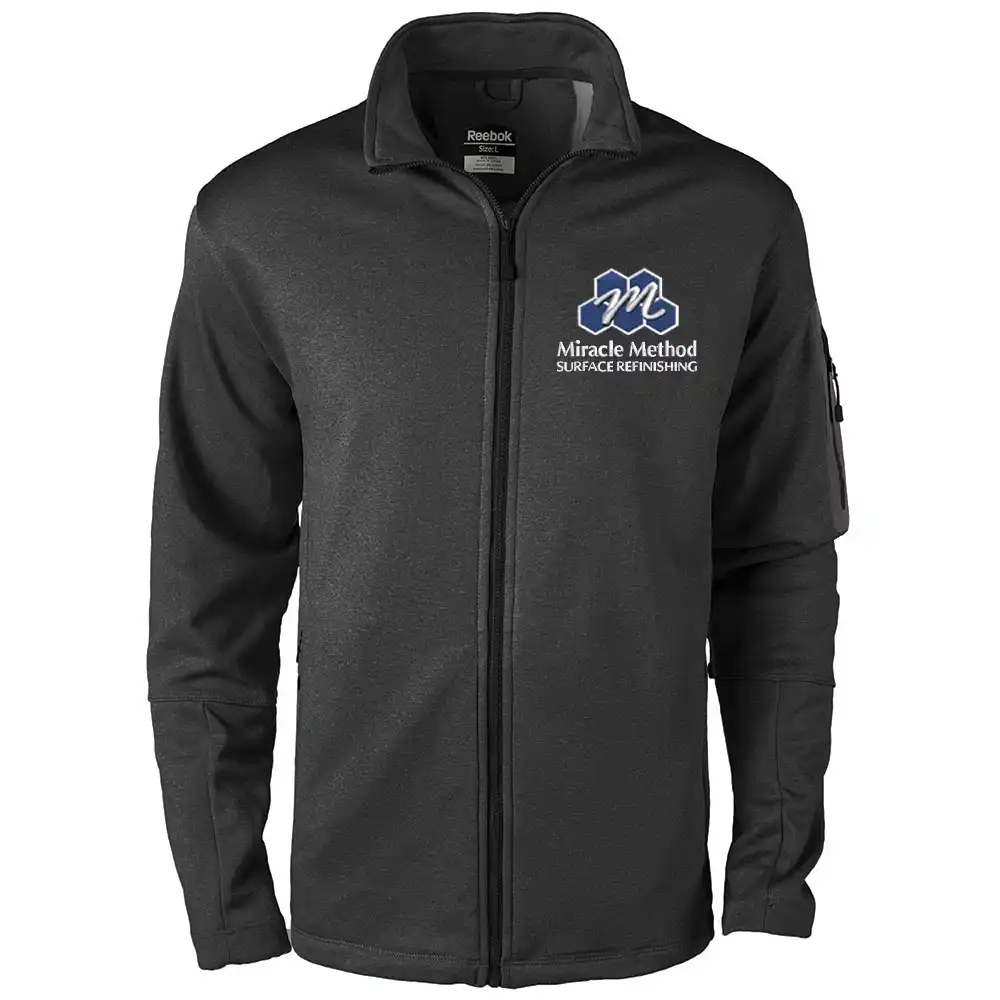 Front view of a custom embroidered women's Miracle Method black freestyle jacket