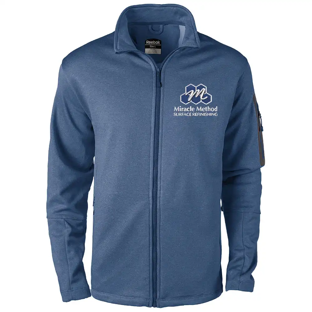 Front view of a custom embroidered women's Miracle Method navy blue freestyle jacket